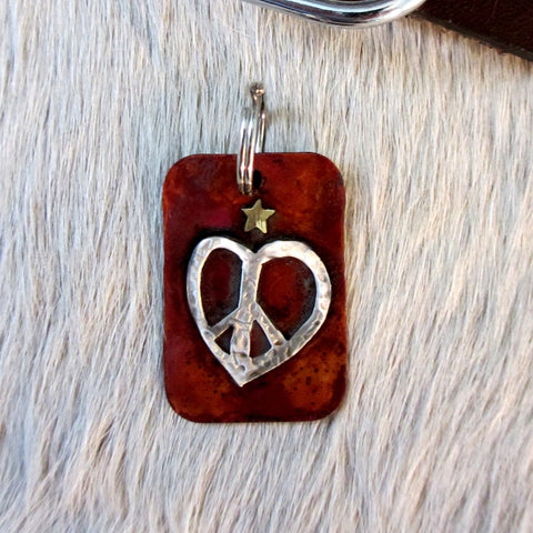dog tag with heart shaped peace sign